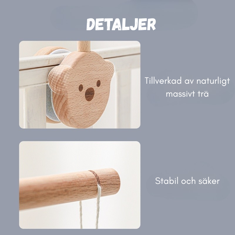 Träfäste för mobil till spjälsäng